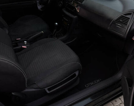 Черный Ситроен С4, объемом двигателя 1.6 л и пробегом 209 тыс. км за 6000 $, фото 24 на Automoto.ua