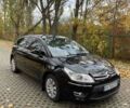 Черный Ситроен С4, объемом двигателя 1.59 л и пробегом 205 тыс. км за 3799 $, фото 1 на Automoto.ua