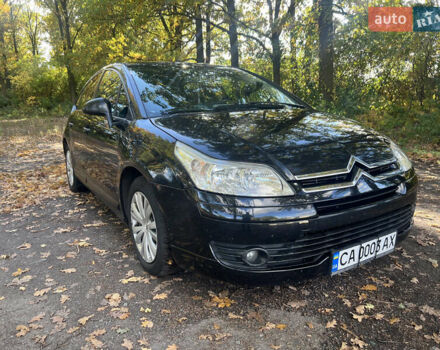 Черный Ситроен С4, объемом двигателя 1.59 л и пробегом 260 тыс. км за 5500 $, фото 1 на Automoto.ua
