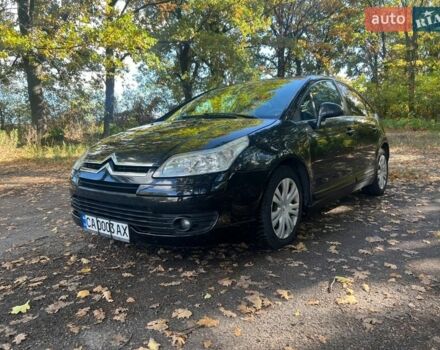 Черный Ситроен С4, объемом двигателя 1.59 л и пробегом 260 тыс. км за 5300 $, фото 1 на Automoto.ua