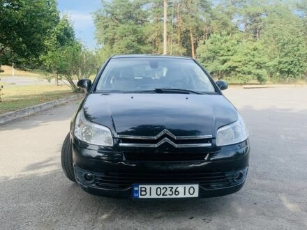 Черный Ситроен С4, объемом двигателя 1.6 л и пробегом 300 тыс. км за 3530 $, фото 1 на Automoto.ua