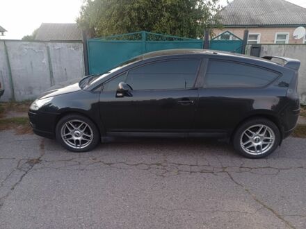 Черный Ситроен С4, объемом двигателя 1.6 л и пробегом 300 тыс. км за 3000 $, фото 1 на Automoto.ua