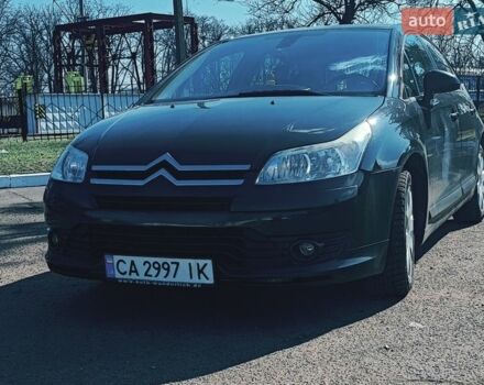 Черный Ситроен С4, объемом двигателя 1.59 л и пробегом 239 тыс. км за 4650 $, фото 1 на Automoto.ua