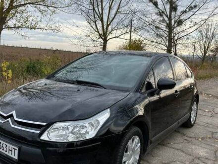 Черный Ситроен С4, объемом двигателя 1.6 л и пробегом 333 тыс. км за 5800 $, фото 1 на Automoto.ua