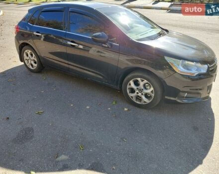 Черный Ситроен С4, объемом двигателя 1.6 л и пробегом 130 тыс. км за 7000 $, фото 1 на Automoto.ua