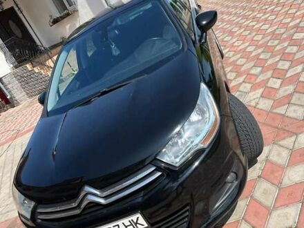 Черный Ситроен С4, объемом двигателя 1.56 л и пробегом 271 тыс. км за 6500 $, фото 1 на Automoto.ua