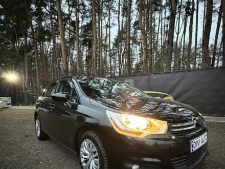 Черный Ситроен С4, объемом двигателя 1.6 л и пробегом 275 тыс. км за 7700 $, фото 1 на Automoto.ua