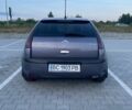 Фиолетовый Ситроен С4, объемом двигателя 1.59 л и пробегом 243 тыс. км за 3500 $, фото 1 на Automoto.ua