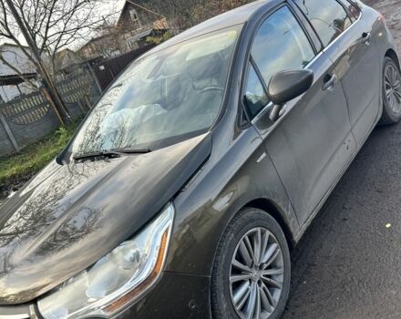 Коричневый Ситроен С4, объемом двигателя 1.6 л и пробегом 300 тыс. км за 4064 $, фото 1 на Automoto.ua