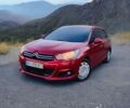 Красный Ситроен С4, объемом двигателя 1.59 л и пробегом 320 тыс. км за 4500 $, фото 1 на Automoto.ua