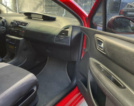 Красный Ситроен С4, объемом двигателя 1.6 л и пробегом 231 тыс. км за 1799 $, фото 10 на Automoto.ua