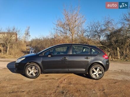 Красный Ситроен С4, объемом двигателя 1.6 л и пробегом 250 тыс. км за 4000 $, фото 1 на Automoto.ua