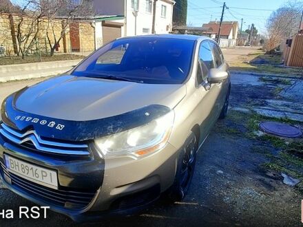 Желтый Ситроен С4, объемом двигателя 1.6 л и пробегом 171 тыс. км за 5000 $, фото 1 на Automoto.ua