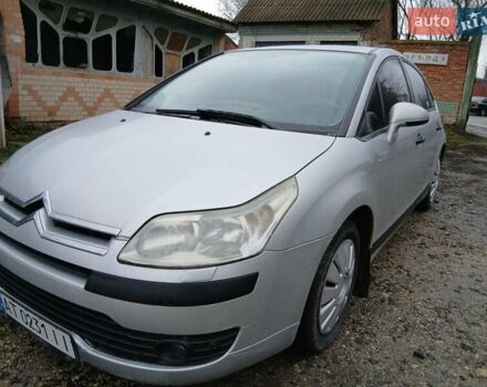 Серый Ситроен С4, объемом двигателя 1.59 л и пробегом 235 тыс. км за 3000 $, фото 1 на Automoto.ua