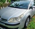 Серый Ситроен С4, объемом двигателя 1.6 л и пробегом 256 тыс. км за 4500 $, фото 1 на Automoto.ua