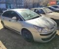 Серый Ситроен С4, объемом двигателя 1.6 л и пробегом 270 тыс. км за 2500 $, фото 1 на Automoto.ua
