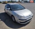 Серый Ситроен С4, объемом двигателя 1.59 л и пробегом 370 тыс. км за 4200 $, фото 1 на Automoto.ua
