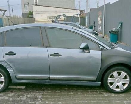 Серый Ситроен С4, объемом двигателя 1.59 л и пробегом 253 тыс. км за 3500 $, фото 1 на Automoto.ua