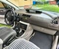 Серый Ситроен С4, объемом двигателя 1.59 л и пробегом 215 тыс. км за 4400 $, фото 18 на Automoto.ua