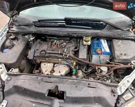 Серый Ситроен С4, объемом двигателя 1.6 л и пробегом 288 тыс. км за 3500 $, фото 11 на Automoto.ua