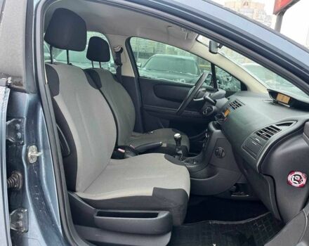 Серый Ситроен С4, объемом двигателя 1.4 л и пробегом 239 тыс. км за 4390 $, фото 10 на Automoto.ua