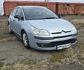 Серый Ситроен С4, объемом двигателя 1.4 л и пробегом 225 тыс. км за 3700 $, фото 1 на Automoto.ua