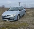 Серый Ситроен С4, объемом двигателя 1.4 л и пробегом 225 тыс. км за 3700 $, фото 1 на Automoto.ua