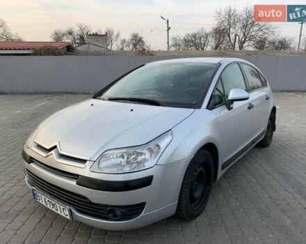 Серый Ситроен С4, объемом двигателя 1.6 л и пробегом 311 тыс. км за 2999 $, фото 1 на Automoto.ua
