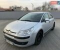 Серый Ситроен С4, объемом двигателя 1.6 л и пробегом 311 тыс. км за 2999 $, фото 1 на Automoto.ua