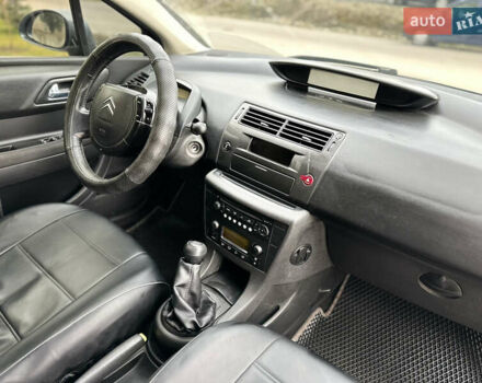 Серый Ситроен С4, объемом двигателя 1.59 л и пробегом 431 тыс. км за 2800 $, фото 37 на Automoto.ua