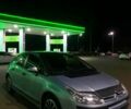 Серый Ситроен С4, объемом двигателя 1.4 л и пробегом 380 тыс. км за 3399 $, фото 1 на Automoto.ua