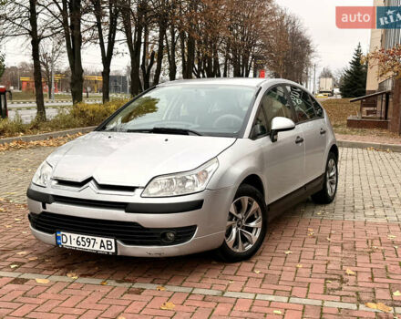 Серый Ситроен С4, объемом двигателя 1.36 л и пробегом 290 тыс. км за 3300 $, фото 2 на Automoto.ua