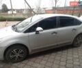 Серый Ситроен С4, объемом двигателя 1.4 л и пробегом 215 тыс. км за 3500 $, фото 1 на Automoto.ua