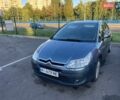 Серый Ситроен С4, объемом двигателя 1.4 л и пробегом 239 тыс. км за 5500 $, фото 1 на Automoto.ua