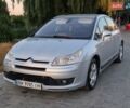 Серый Ситроен С4, объемом двигателя 1.6 л и пробегом 256 тыс. км за 3950 $, фото 1 на Automoto.ua