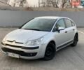 Серый Ситроен С4, объемом двигателя 1.6 л и пробегом 311 тыс. км за 2999 $, фото 1 на Automoto.ua