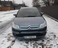 Серый Ситроен С4, объемом двигателя 1.6 л и пробегом 330 тыс. км за 3000 $, фото 1 на Automoto.ua