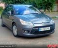 Серый Ситроен С4, объемом двигателя 1.6 л и пробегом 230 тыс. км за 2800 $, фото 1 на Automoto.ua