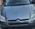 Серый Ситроен С4, объемом двигателя 1.6 л и пробегом 275 тыс. км за 3850 $, фото 1 на Automoto.ua