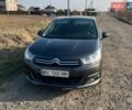 Серый Ситроен С4, объемом двигателя 1.56 л и пробегом 240 тыс. км за 5800 $, фото 1 на Automoto.ua
