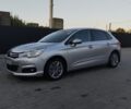 Серый Ситроен С4, объемом двигателя 1.6 л и пробегом 251 тыс. км за 6950 $, фото 1 на Automoto.ua