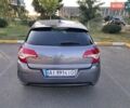 Серый Ситроен С4, объемом двигателя 1.6 л и пробегом 166 тыс. км за 5800 $, фото 1 на Automoto.ua