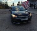Серый Ситроен С4, объемом двигателя 1.6 л и пробегом 163 тыс. км за 5550 $, фото 1 на Automoto.ua
