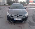 Серый Ситроен С4, объемом двигателя 1.56 л и пробегом 236 тыс. км за 3500 $, фото 1 на Automoto.ua