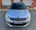 Серый Ситроен С4, объемом двигателя 1.4 л и пробегом 124 тыс. км за 6950 $, фото 1 на Automoto.ua