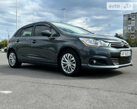 Серый Ситроен С4, объемом двигателя 1.4 л и пробегом 130 тыс. км за 7999 $, фото 1 на Automoto.ua