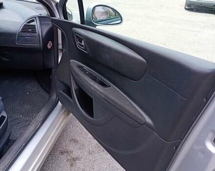 Серый Ситроен С4, объемом двигателя 1.59 л и пробегом 244 тыс. км за 4100 $, фото 1 на Automoto.ua