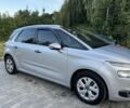 Серый Ситроен С4, объемом двигателя 1.6 л и пробегом 234 тыс. км за 9000 $, фото 1 на Automoto.ua