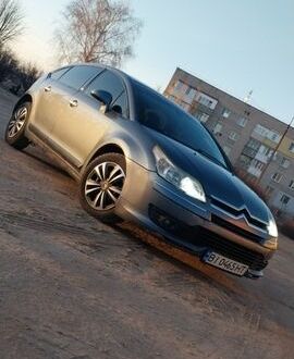 Серый Ситроен С4, объемом двигателя 2 л и пробегом 341 тыс. км за 4300 $, фото 1 на Automoto.ua