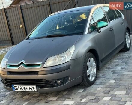 Серый Ситроен С4, объемом двигателя 1.59 л и пробегом 395 тыс. км за 3500 $, фото 1 на Automoto.ua